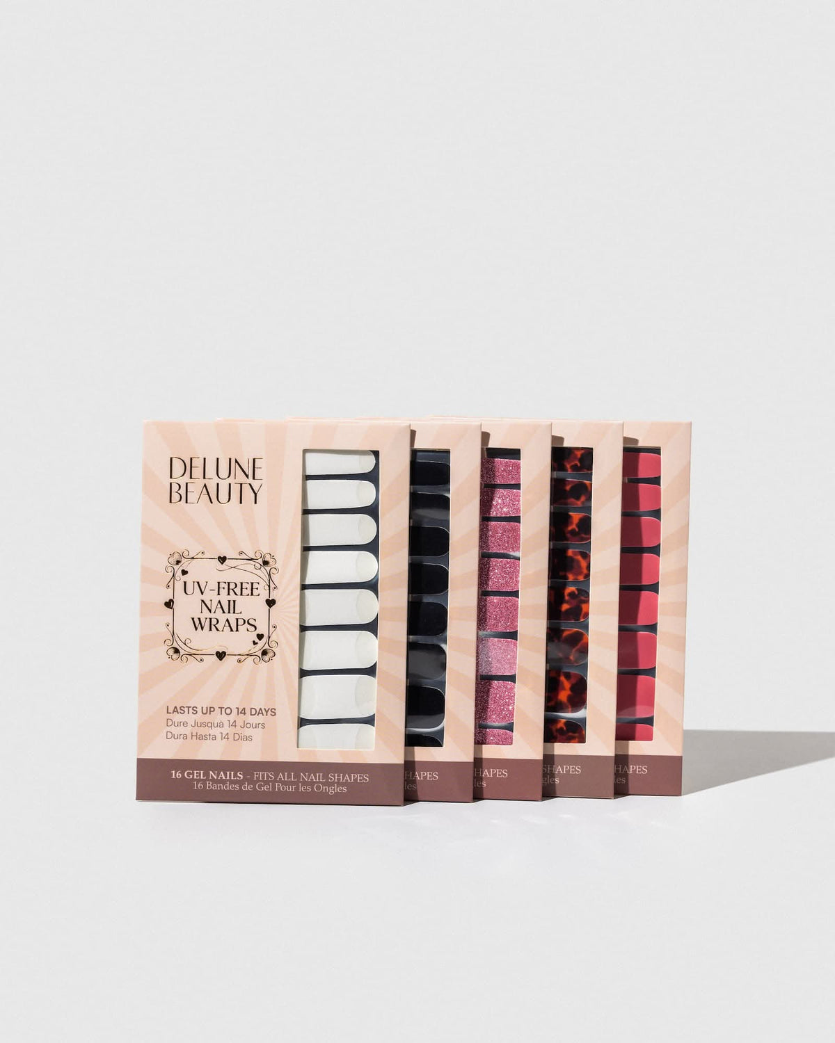 Glitter Bug (Non-UV Nail Wraps): row of Delune Beauty UV-free nail wrap packs standing upright