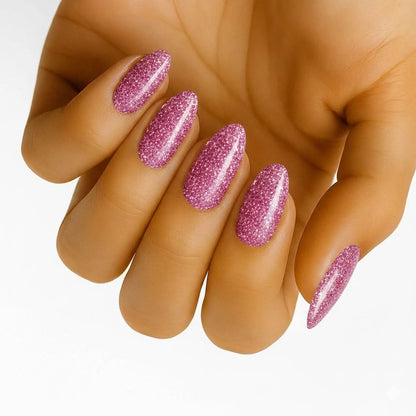 Glitter Bug (Non-UV Nail Wraps): close-up of sparkling pink glitter almond nails